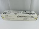 Open end of the ERTL box showing the packaged white tractor-trailer coin bank