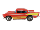 Side view of red Hot Wheels Flying Colors '57 Chevy die-cast car with yellow and white 57 CHEVY graphics and blackwall wheels