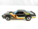Left-side profile of Mattel Hot Wheels Ford Gran Torino Stocker with number 3 racing graphics, hood scoop, and blackwall wheels