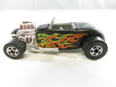 Hot Wheels '32 Ford Roadster front view showing grille, chrome exposed engine, and smaller front wheels