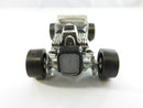 Hot Wheels '32 Ford Roadster right-side view showing yellow and green flame tampos and side exhaust pipes