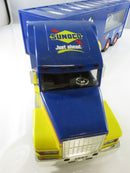 Close-up of molded underside marking for Sun Company Inc. R&M, copyright 1997, and Made in China