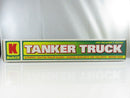 Kwik Fill tanker truck front view showing KF-99 plate and chrome grille