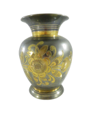 Front view of Indian mixed metal flower vase with gold-tone etched floral decoration, flared neck, and pedestal base