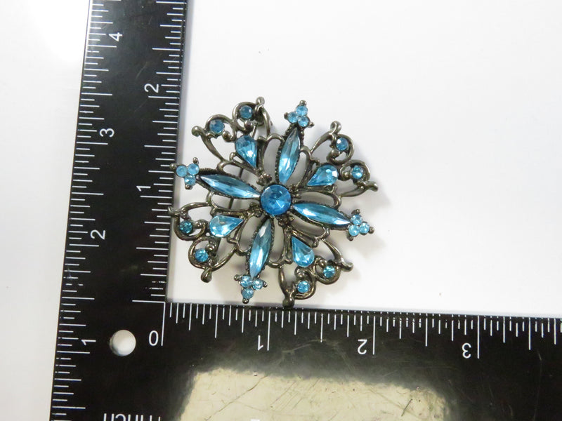 Blue Rhinestone Flower Brooch, Vintage Pierced Metal Pin, Round Pear Marquise Cut, 2"