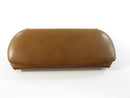 Open brown faux leather eyeglass case showing dark green lining, Dr. John Mills Powell Galax Virginia interior label, and folded paper slip