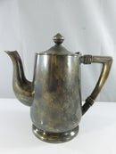 Top view of the Reed & Barton hotel silverplate coffee pot showing the hinged lid, finial, spout, and handle