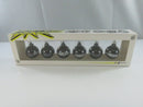 Close view of NuOp Design Kaboom Party Candles packaging marked with Sparking Wicks