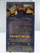 Back view of factory sealed When Harry Met Sally... VHS slipcover showing film stills, Orion Home Video and Nelson Entertainment markings