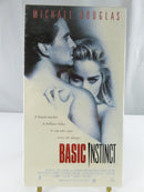 Back of Basic Instinct VHS slipcover showing synopsis, barcode, Live Home Video and Carolco Home Video logos