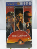 Back of factory-sealed Tequila Sunrise Warner Bros. Hits VHS slipcover showing synopsis, barcode, credits, and format details