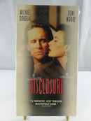 Back of Disclosure VHS slipcover showing film stills, synopsis, UPC barcode, and R rating