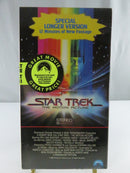 Back of Star Trek: The Motion Picture VHS slipcover showing film stills, synopsis, G rating, and Paramount Home Video logo