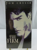 Back of The Firm Paramount VHS slipcover showing synopsis, cast images, UPC, VHS Hi-Fi Stereo, and Dolby Surround marking