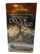 Front of Doctor Zhivago MGM/UA Home Video gold foil VHS slipcase with MGM lion logo and cast artwork.