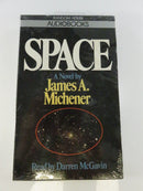 Back of sealed Space audiobook cassette package showing synopsis, barcode, ISBN, and two-cassette playing-time information.