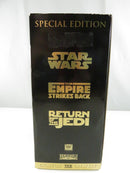 Three Star Wars Trilogy Special Edition VHS tapes with gold slipcovers and visible cassette labels for Star Wars, The Empire Strikes Back, and Return of the Jedi.