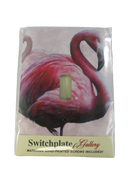 Front of packaged Switchplate Gallery pink flamingo decoupage single-toggle steel switch cover with flamingo artwork.