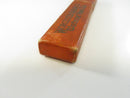 Reverse of the empty Worcester Razor Co straight razor slide box showing wear and handwritten initials or notes