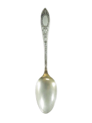 Full front view of Frank W. Smith Lafayette sterling silver teaspoon with scrolling foliate handle and plain oval medallion.