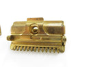 Close view of the detachable gold-tone knurled razor handle