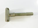 Side view of the Gillette Slim Adjustable razor showing the knurled handle and numbered adjustment dial
