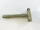 Close-up of the knurled handle end and twist-to-open mechanism