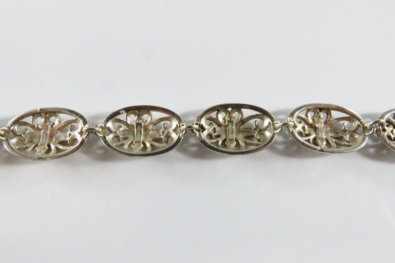 Christian Cross Oval Panel Link Bracelet in Sterling Silver 6 3/4" Lobster Clasp