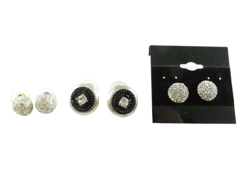 Pair of silver and black earrings with packaging on a white background