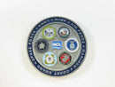 NCL challenge coin side with Norwegian Cruise Line logo, American flag, stars, and military values