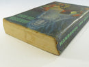 Angled view of Handbook for Boys showing the spine, worn cover edge, and age-toned page block.