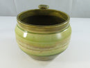 Unglazed base of green studio pottery mug with incised initials/signature and '15 date.