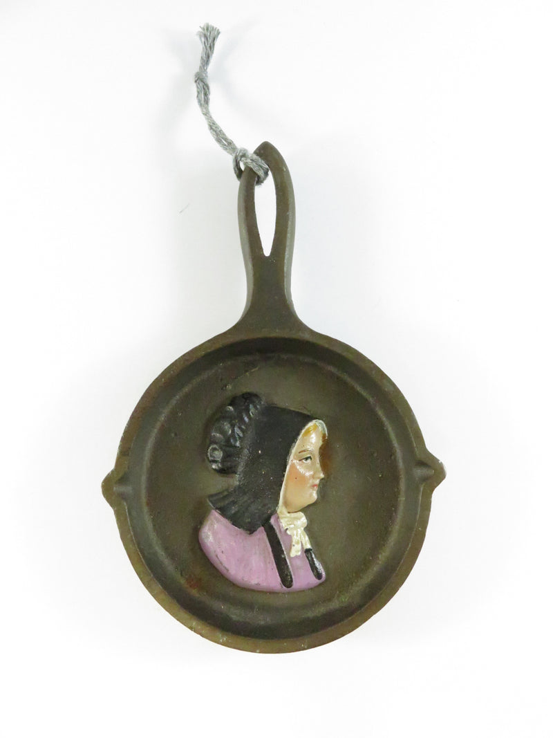 Vintage Cast Iron Miniature Skillet with Painted Amish Girl - 6 3/8"
