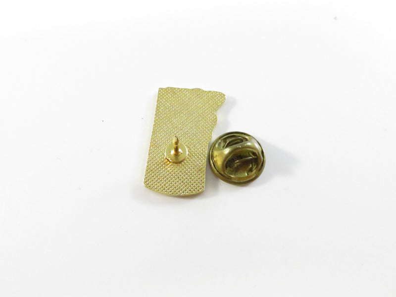 Praying figure at cross pinback lapel pin, gold tone religious window motif