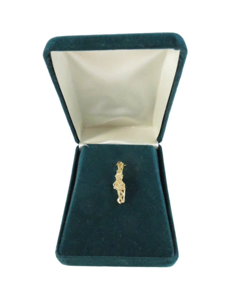 14K Gold Mr. Peanut Pendent in green velvet box on a white background