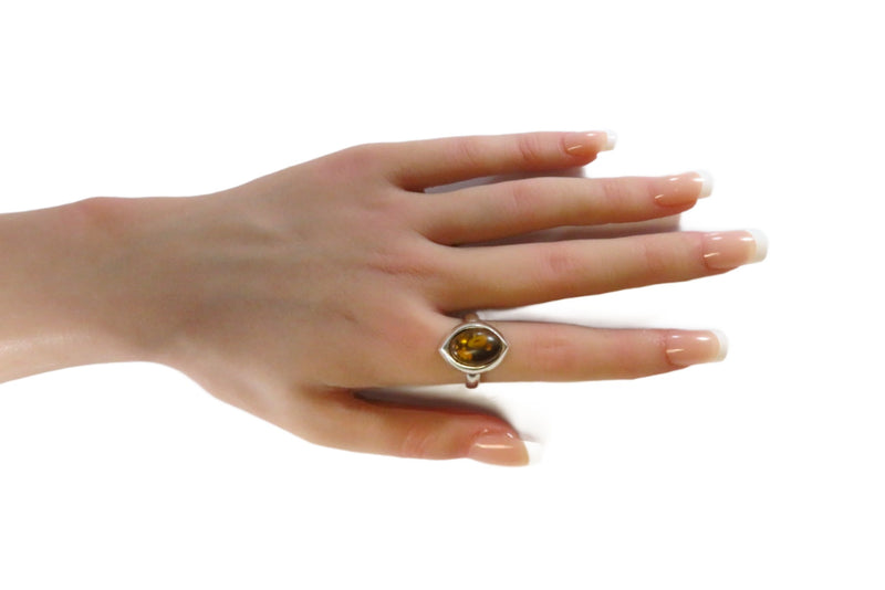 Vintage Oval Amber Cabochon in Sterling Navette Formed Setting on hand