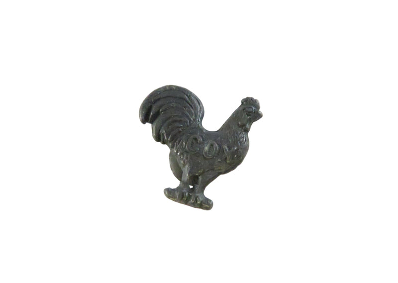 Decorative rooster figurine on a white background