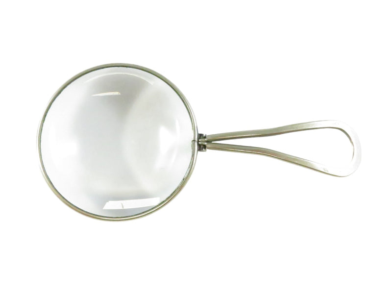 Handheld magnifying glass on a white background