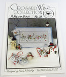 A Frosty Feast No 29 Crossed Wing Collection Cross Stitch Pattern — front view