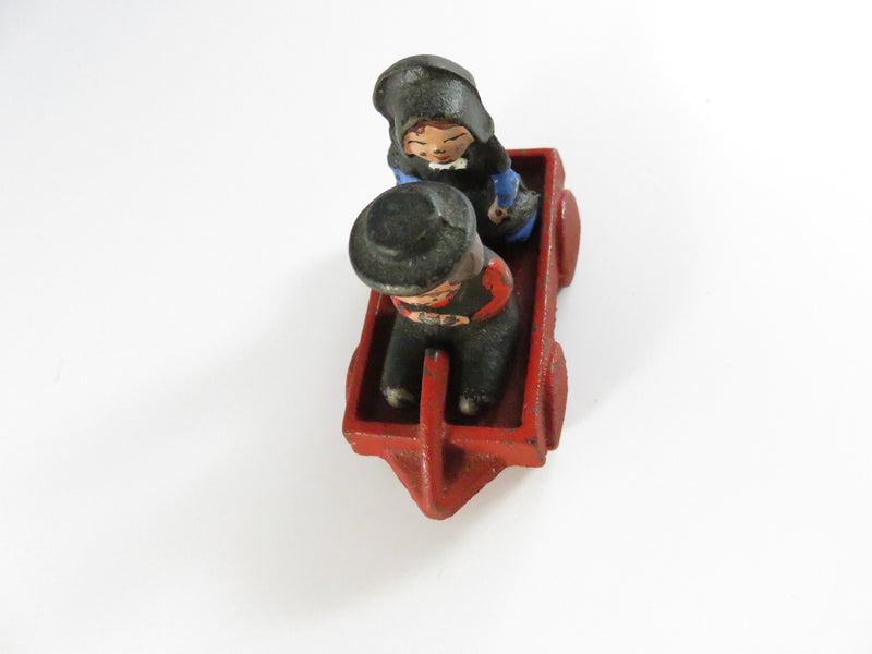 Vintage Cast Iron Amish Children in Red Wagon – Miniature Folk Art Figural Set