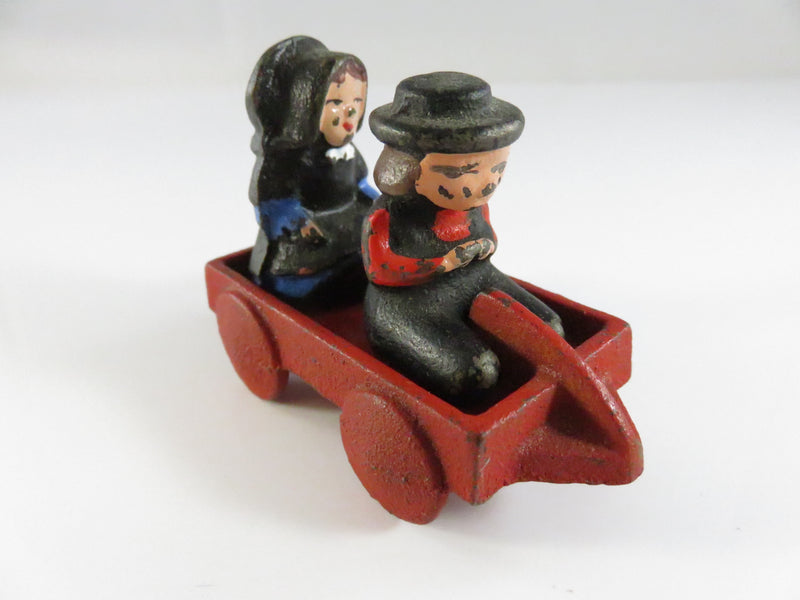 Vintage Cast Iron Amish Children in Red Wagon – Miniature Folk Art Figural Set