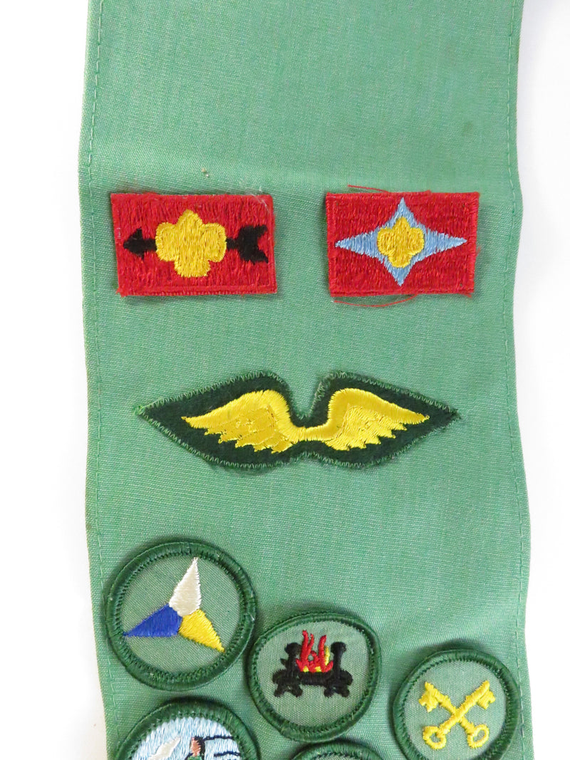 Girl Scout Sash Section with Council Tab, Membership Insignia, Brownie Wings, and Fun Patches