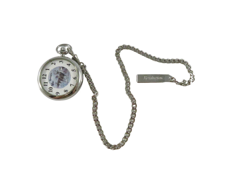 Silver pocket watch with chain on a white background