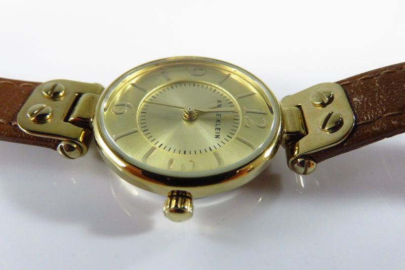 Anne Klein Gold Gilded Analog Quartz Wrist Watch Running Hinged Leather Strap