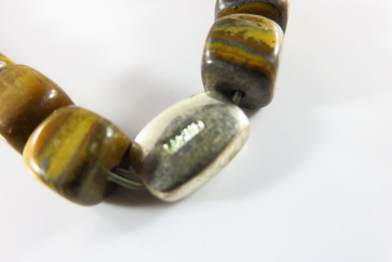 6 3/4" Stretch Bracelet 22 Square Tiger Eye Bead One Silver Oval "Hope" Bead close up of "hope" bead with marking
