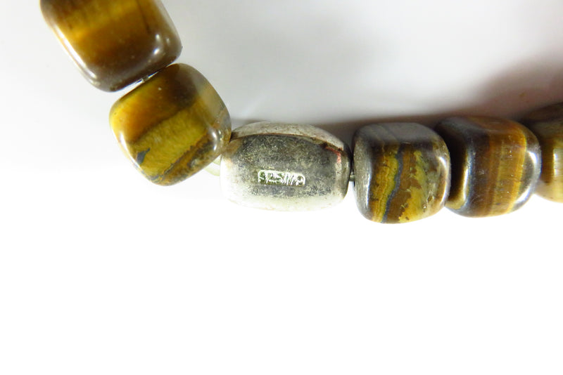 6 3/4" Stretch Bracelet 22 Square Tiger Eye Bead One Silver Oval "Hope" Bead close up of "hope " bead with marking