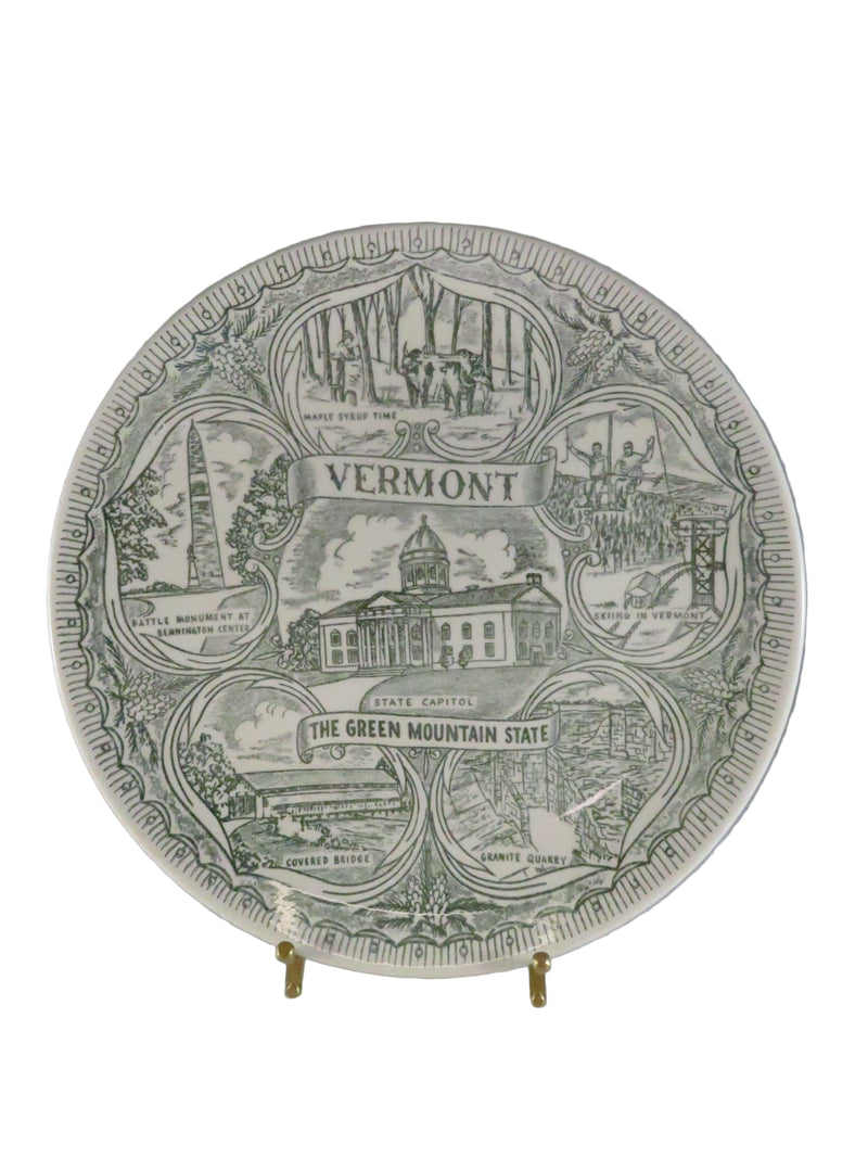 Decorative plate with Vermont-themed design on a gray background