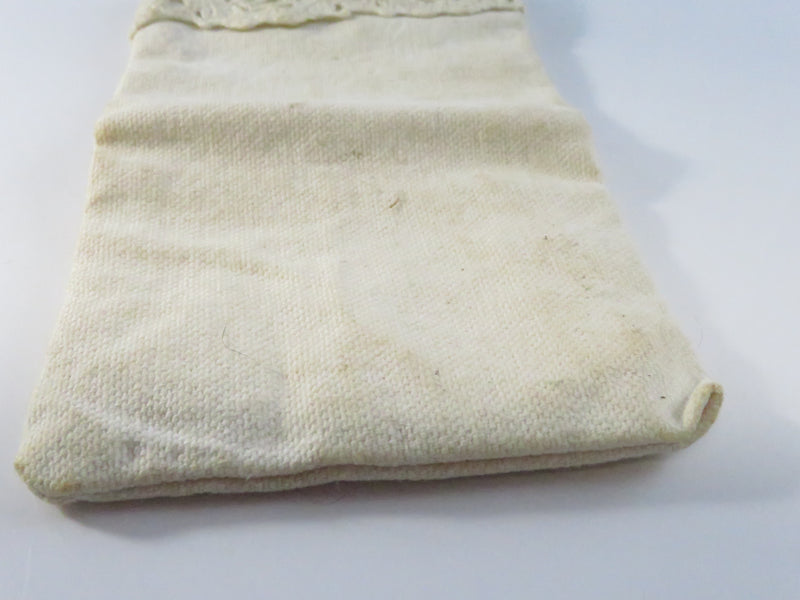 Vintage eyeglass pouch, heavy cloth with cherub brass-tone appliqué, approx. 6 1/2" x 3 1/2"
