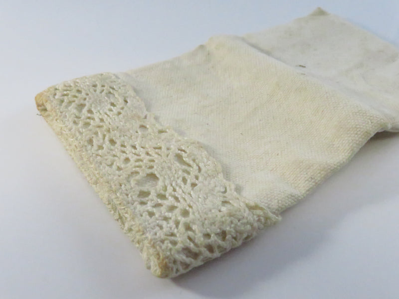 Vintage eyeglass pouch, heavy cloth with cherub brass-tone appliqué, approx. 6 1/2" x 3 1/2"