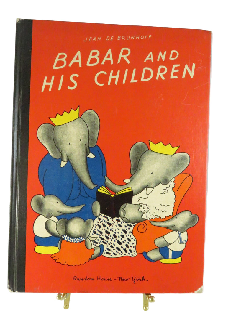 Book cover of 'Babar and His Children' with illustrations of elephants on a red background.